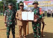 TMMD Ke-124 Resmi Dibuka di Desa Gunung Melati, Wabup Tala Tanam Pohon Bersama Warga