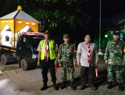 PRAMUKA KWARAN ANGSANA MEMBANTU PENGAMANAN PAWAI TANGLONG DI KECAMATAN ANGSANA