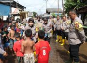 Polres Tanah Laut Gelar Trauma Healing, Pulihkan Keceriaan Anak-Anak Korban Banjir di Desa Benua Raya